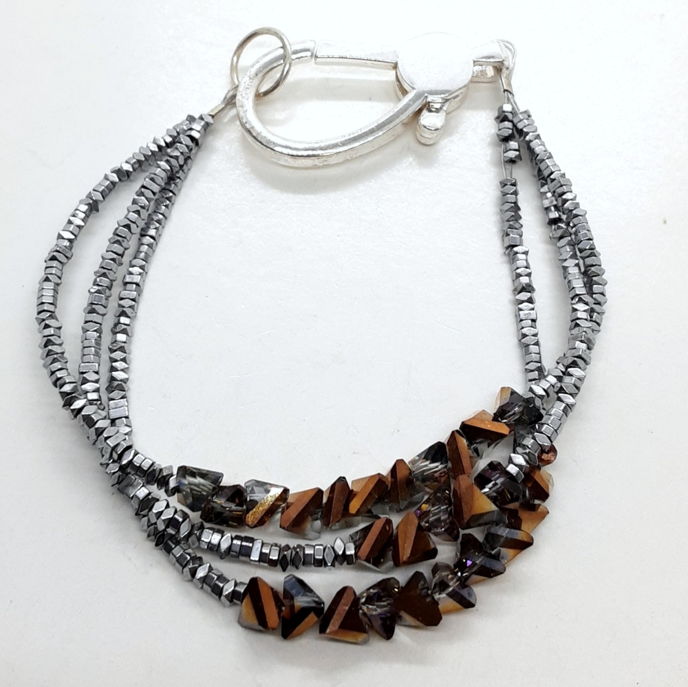 7.5 inch triple strand glass beaded bracelet